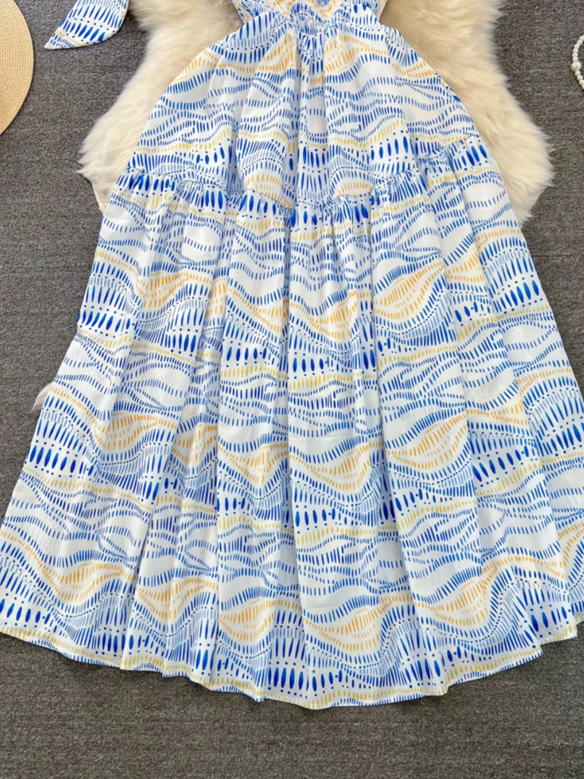 Oblique Neckline Dress with A-Line Silhouette Waist-Cinching Detail and Printed Pattern Design